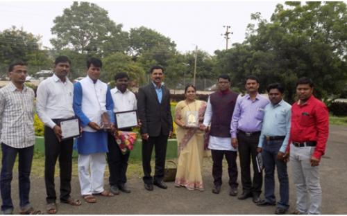 Principal Dr.Deshmane P.B. with staff members