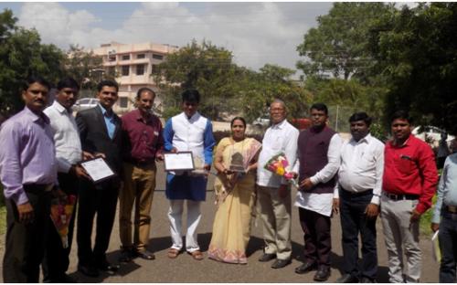 Principal Dr.Deshmane P.B.,Hon.Pandurang Kshirsagar  and Hon.Dr.Raju Machale with staff members