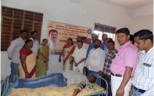 A volunteer donating blood on the occasion of   Birthday of Hon. Jaydattaji (Anna)