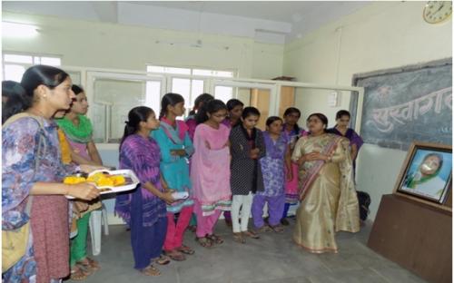 Dr.Shama Lomte with college girl students on the occasion of Mahila Din